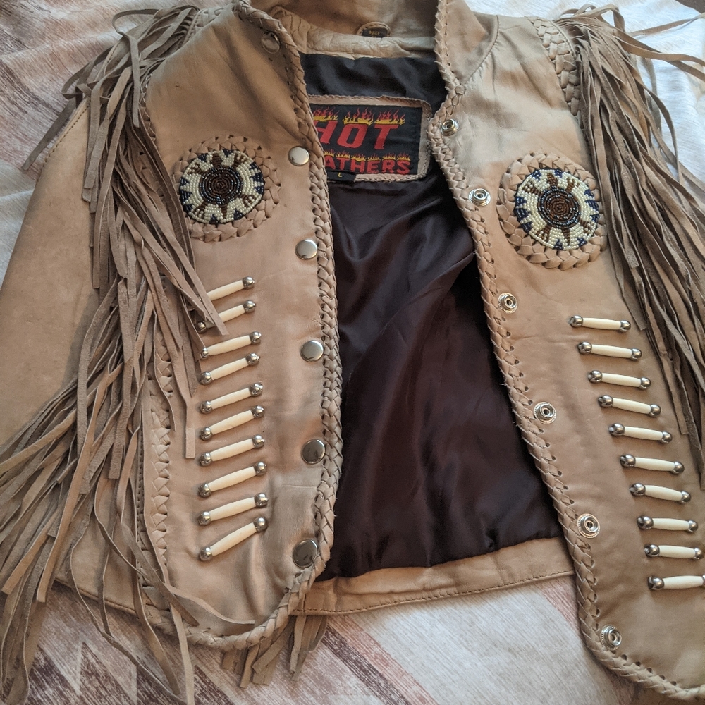 Leather chaps and matching vest